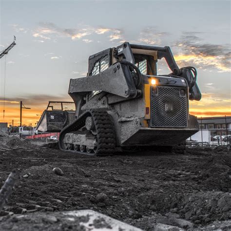 track loader stuck in mud